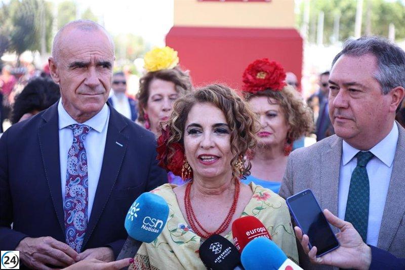 Muñoz y Montero alientan a vivir la Feria de Sevilla.